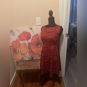 This beautiful A-line dress is bold with color and absolutely gorgeous!!